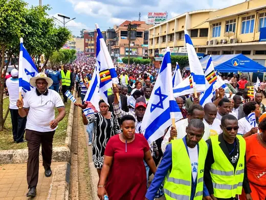 Marching through town with flags