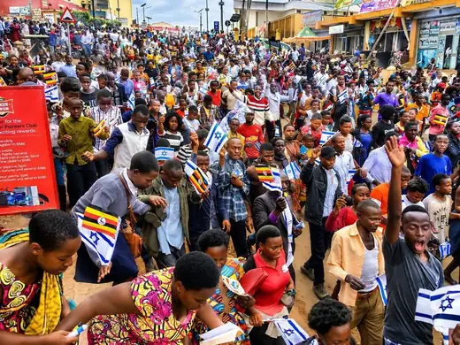 The procession moves through the streets