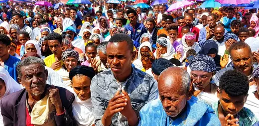 The congregation in prayer